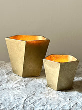 Cast bronze vessels, some with lids, all in bright bronze finsih.
