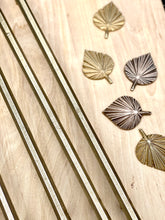 GEO series bronze palm leaf with vintage bone, glass and brass beads.