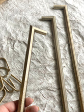 PYRA series, 18" cast bronze mitred handle, appliance pull, hanging rack.