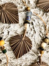 GEO series bronze palm leaf with vintage bone, glass and brass beads.