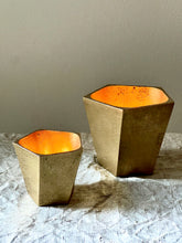 Cast bronze vessels, some with lids, all in bright bronze finsih.